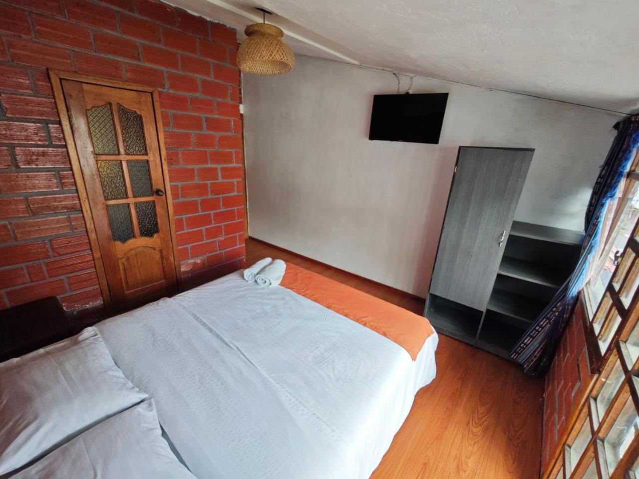 Garden House Hostal Banos  Bagian luar foto